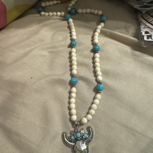 White bead skull head necklace
